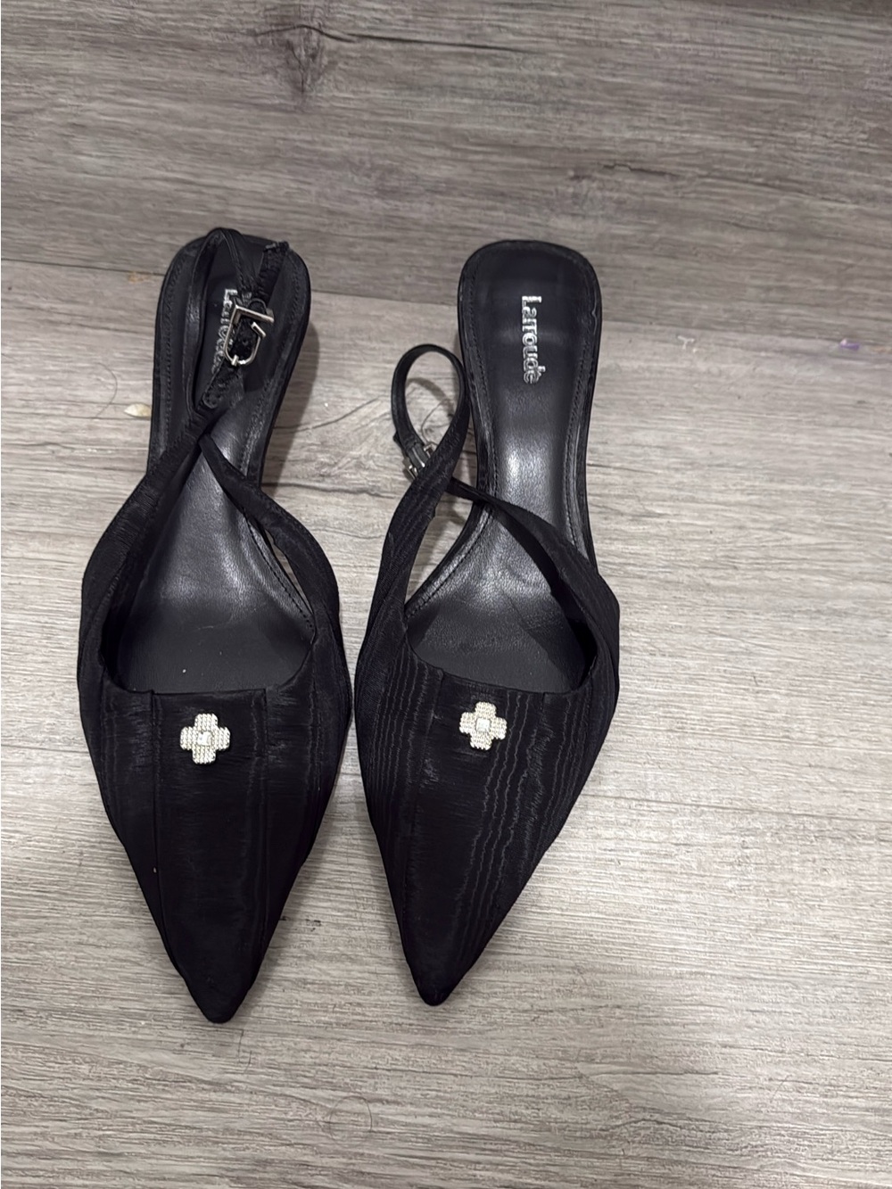 Larroude Black Pointed Slingback Heels with Rhinestone Cross Accent